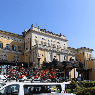 View of beautiful Milan Airport hotel over top of van with bikes on bike racks